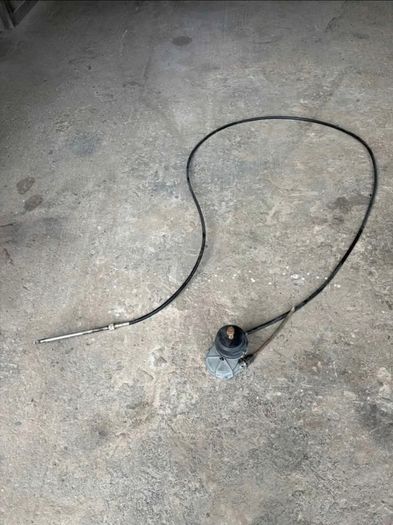 Boat steering helm and cable.