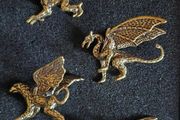 4 brass dragons.