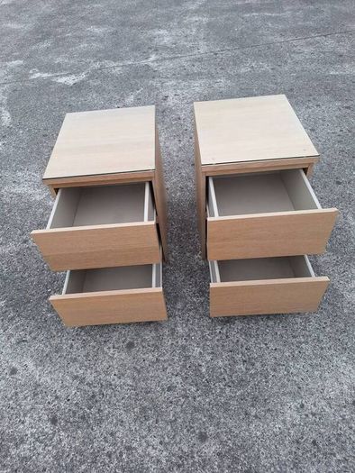 Two lovely bedside lockers with glass tops