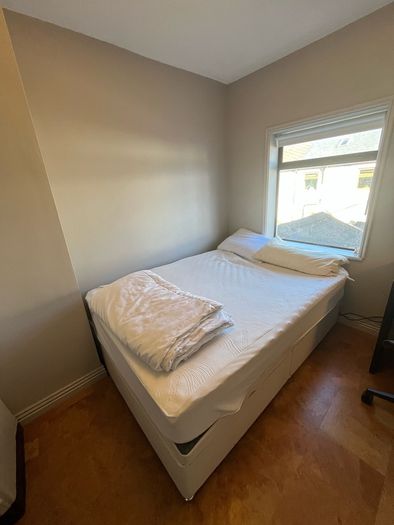 Double bed  - ottoman-style side-opening with storage