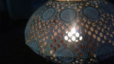 Decorative metal candle holder