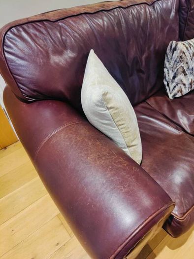 Brown leather sofa and arm chair