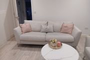 Beige sofa only 2 years old