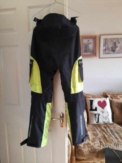 Selection of quality motorbike jackets,  trousers,  helmets  , and boots ..