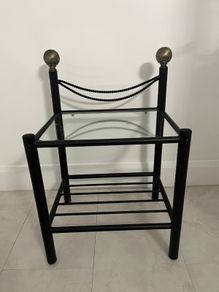 Cast iron lamp table / bedside locker with glass top.