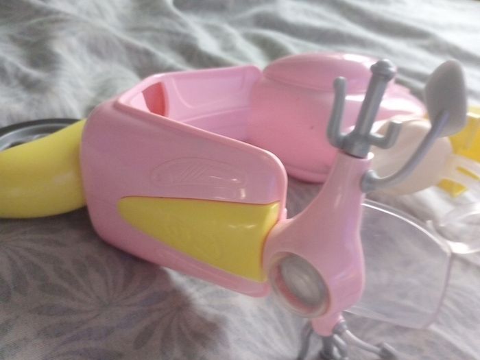 Barbie doll scooter