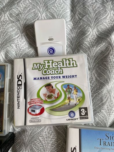 Nintendo DS Lite with games and pedometer