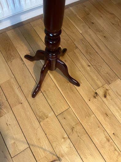Solid maghoney plant stand. 34in high x 13in diameter