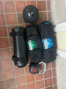 Sandbags, kettlebell, medicine ball