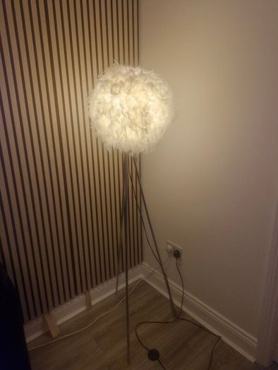 Silver lamp stand with feather shade