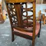 Vintage Wooden Armchair with Upholstered Seat and Decorative Back Design Image 3