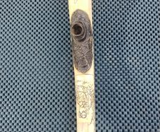Carved walrus tusk