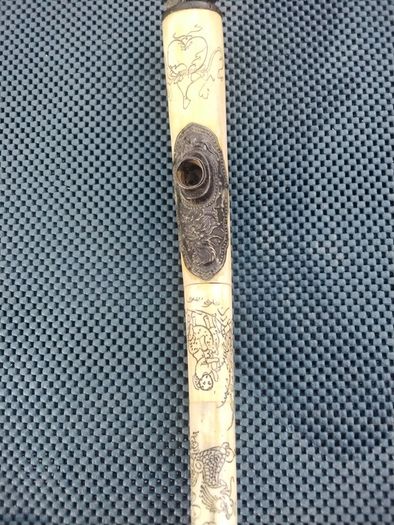 Carved walrus tusk