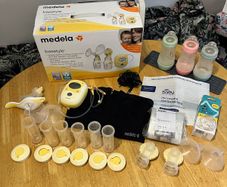 Medela breast pump & extras