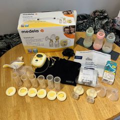 Medela breast pump & extras