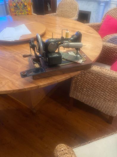 Old Vesta sowing machine with cover