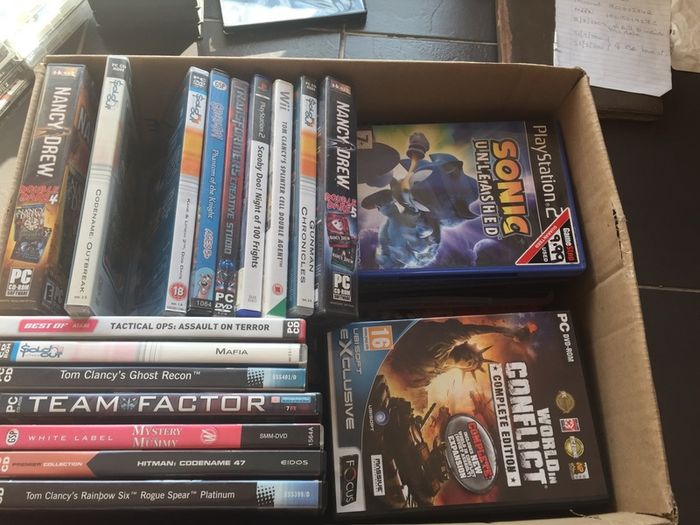 Box of top brand PC games including special editions.Mostly FPS.