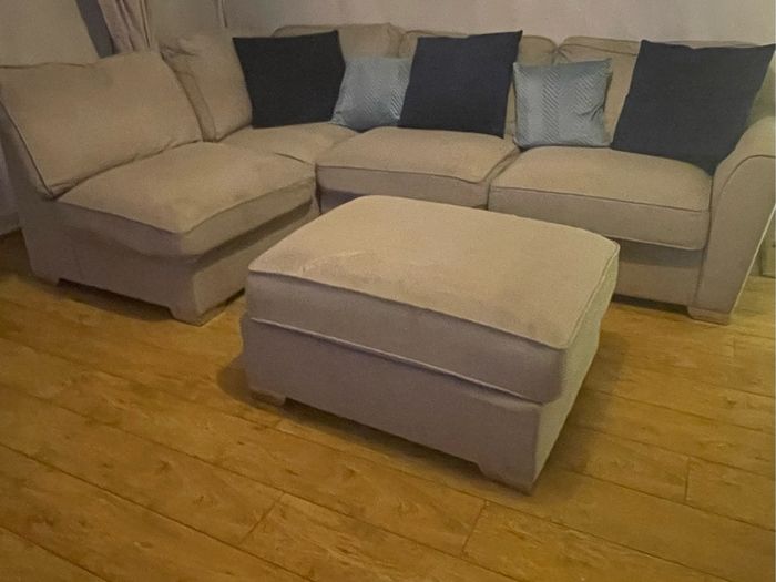 Large grey L shaped sofa & matching footstool