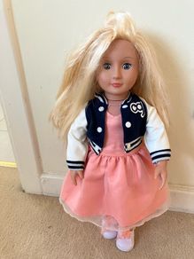 Our generation doll with dress, jacket and shoes