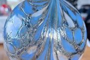 Decorative glass hanging ornament.