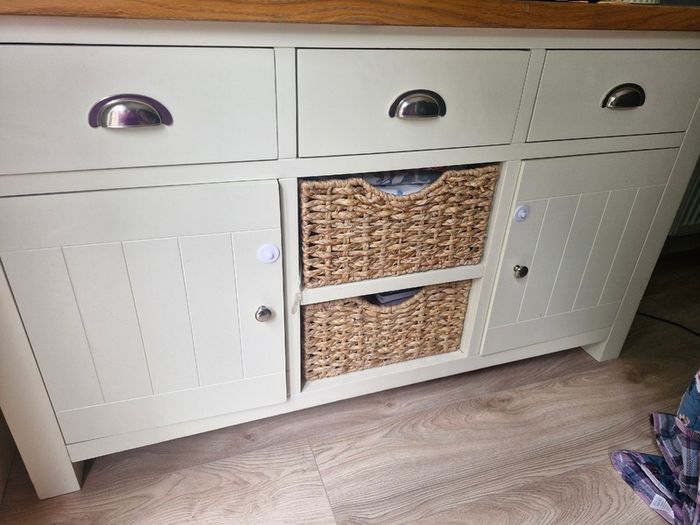 Cream and oak sideboard