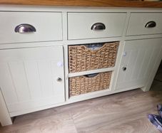 Cream and oak sideboard