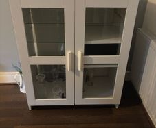SKRUVBY Cabinet with glass doors, white, 70x90 cm