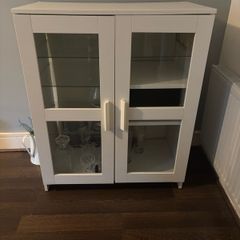 SKRUVBY Cabinet with glass doors, white, 70x90 cm