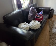 leather lounge suite and ottoman