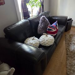 leather lounge suite and ottoman