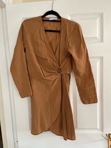 Wrap dress in beige color