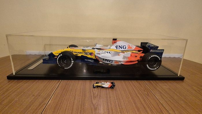 A 1:6 scale (32 inches long Formula 1 car) limited edition model of the 2007 Season ING Renault R27 F1 Team car