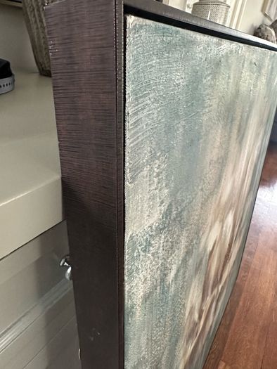 Large Floral canvas with Walnut surround.