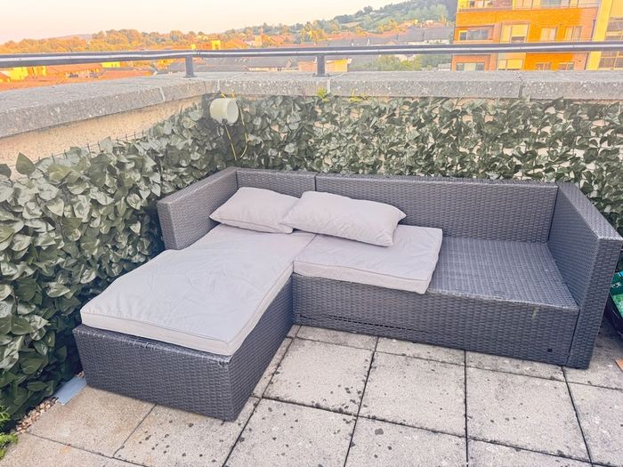 Garden sofa with cushions