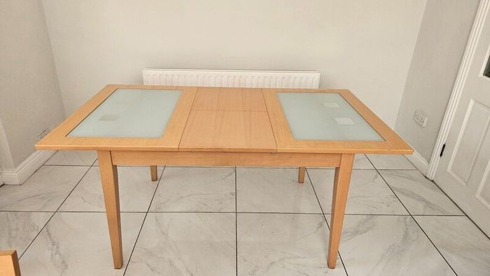 Extendable Light Wood Dining Table with Glass Pane