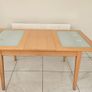 Extendable Light Wood Dining Table with Glass Pane Image 3