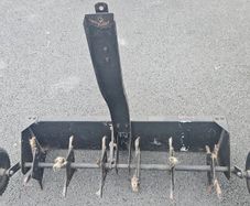 Tow behind lawn aerator