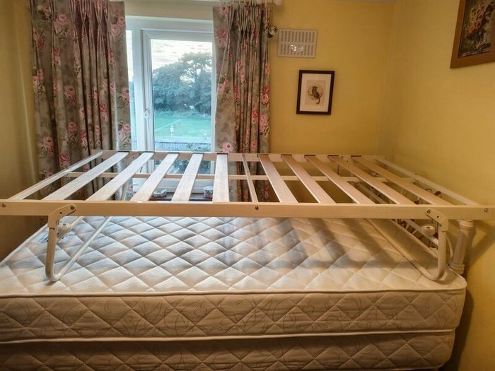 Single bed with pullout bed underneath