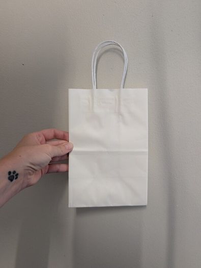 Small white paper bags
