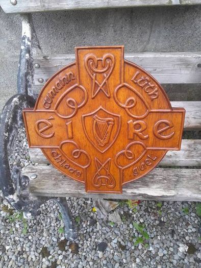 carved g.aa.a shield