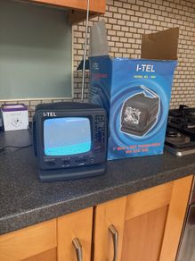 I-Tel black and white 5" television with am/fm radio