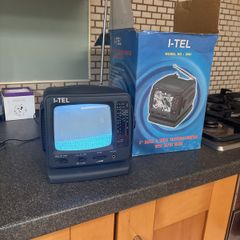 I-Tel black and white 5" television with am/fm radio