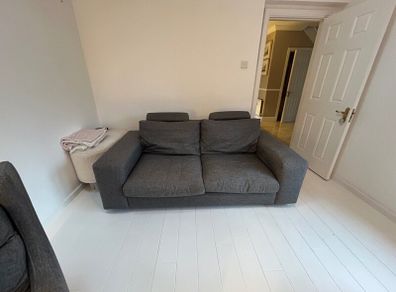 Couch and swivel arm chair .