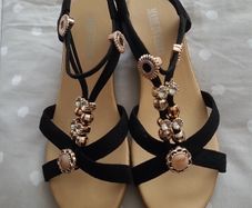 ladies black and gold sandals
