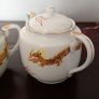 Japanese Porcelain Dragonware Tea Set with Geisha Lithopane. Image 8