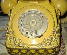 Vintage French Provincial or Victorian-style Ornate GPO Rotary Dial Telephone Yellow Body Accented with Decorative Gold-Tone Cherub and Scroll. Postage Available