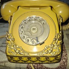 Vintage French Provincial or Victorian-style Ornate GPO Rotary Dial Telephone Yellow Body Accented with Decorative Gold-Tone Cherub and Scroll. Postage Available