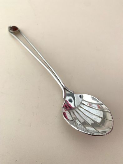 Antique coffee spoon with amber