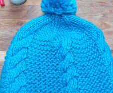 The North Face turquoise winter hat