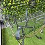 Ornate Glass-Top Metal Table Image 2
